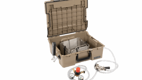 Decked D-Co kegger insert turns your regular gear case into a mobile beer keg - shown in tan with refrigeration coils, spout, and gauges.