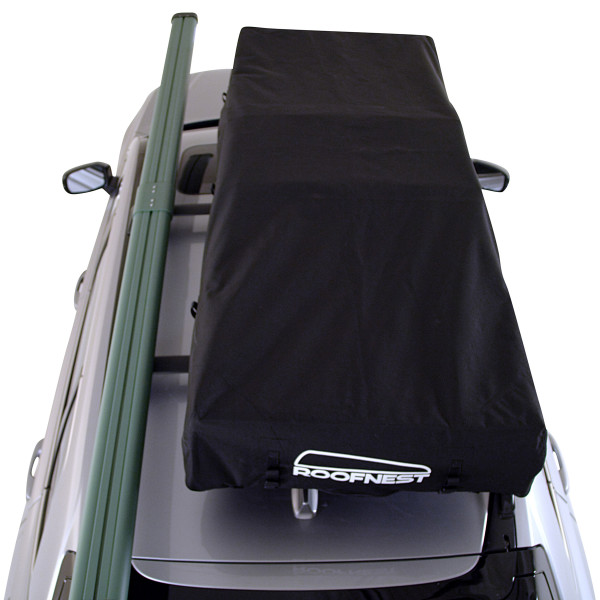 Meadowlark XL Roofnest car-top tent is shown from a top down view on top of an SUV in its black protective case